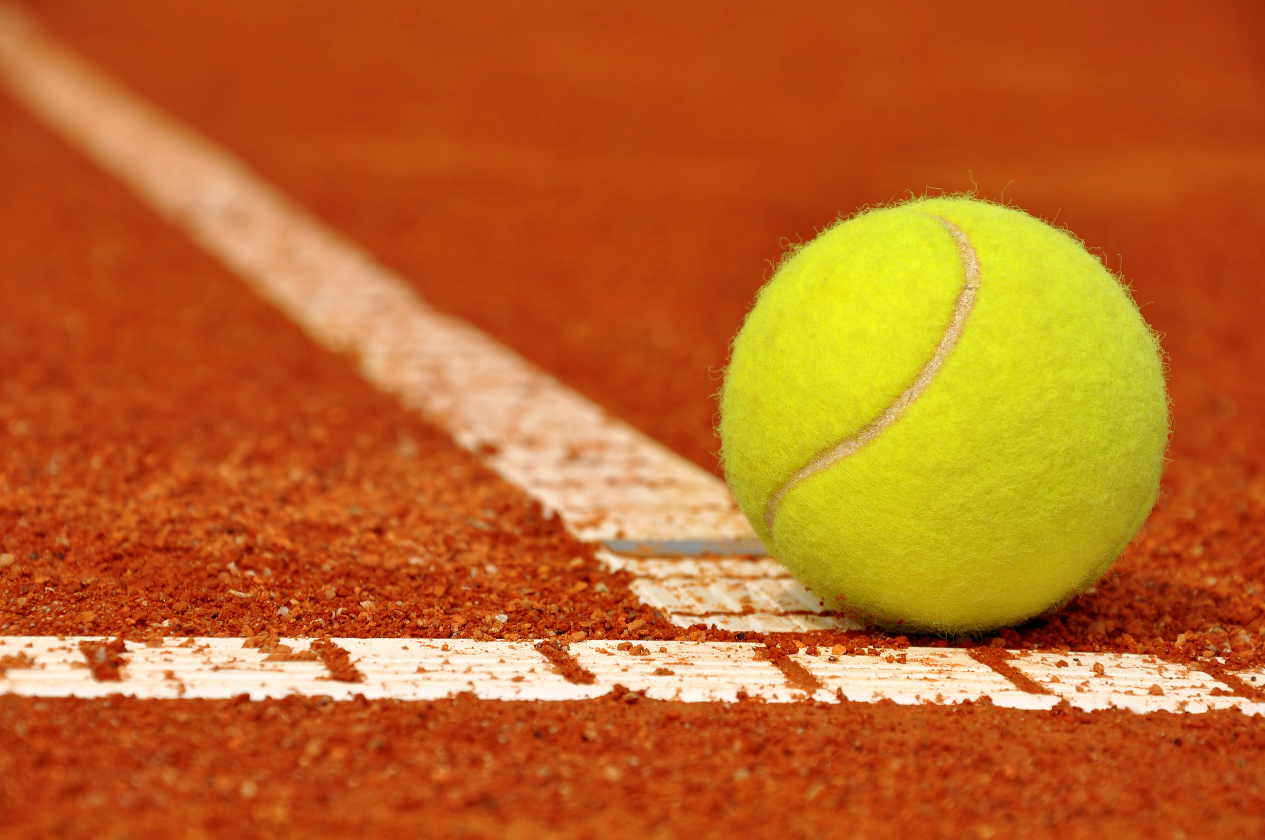 Tennis ball on a tennis clay court | Veurey Voroize